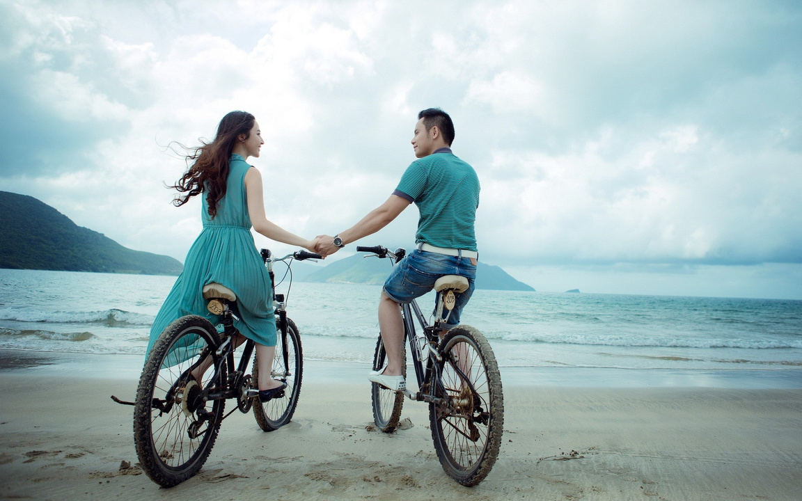 Couple Riding Bikes
